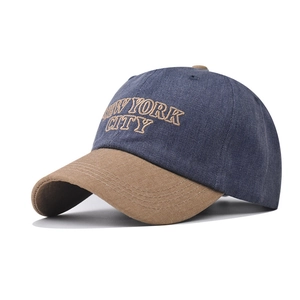Detail of high-quality New York City embroidery on a two-tone washed cotton baseball cap