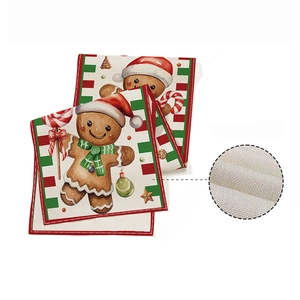Christmas table runner with gingerbread man print and festive red green stripe border