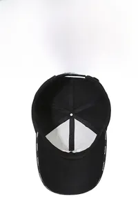 Detail view of the black wool baseball cap interior with white FASHION lettering