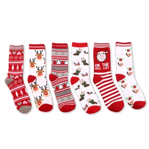 Christmas socks gift set featuring Santa, reindeer, and snowflakes patterns in red and white