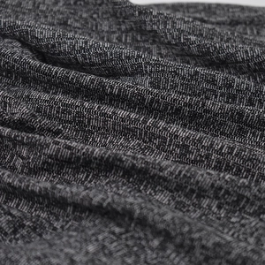 Unisex heather grey knitted slouchy beanie hat featuring soft textured fabric detail