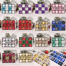 Grid display of 16 different colored Christmas ball sets with varied surface textures