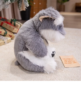 Detail of plush Schnauzer toy showing realistic grey fur texture and paw pads