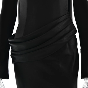 Detailed view of elegant waist pleats and satin texture on a slim-fit black maxi dress