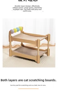 Close-up of dual-layer cat scratching post with wooden frame and colorful toy balls