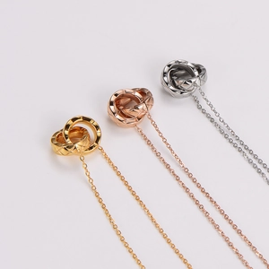 Elegant quilted pattern interlocking double rings necklace in gold, rose gold and silver