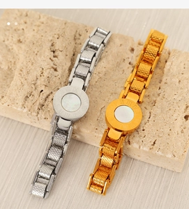 Close-up of Roman numerals shell dial bracelets in gold and silver stainless steel