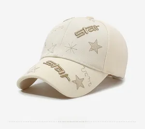 Close-up of golden star embroidery and premium pineapple fabric texture on baseball cap