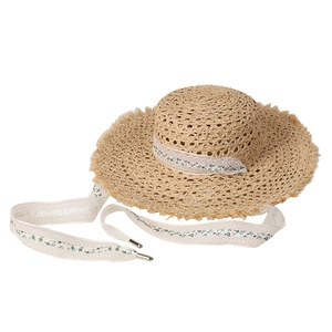 Handwoven raffia straw sun hat with wide frayed brim and white floral lace ribbon detail