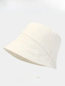 Detail showing bubble texture fabric and color options for the women's bucket hat
