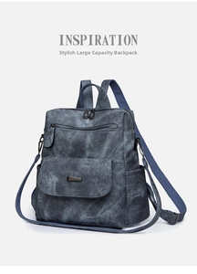 Detailansicht des gewaschenen blauen Vintage-Lederrucksacks mit Reißverschlüssen