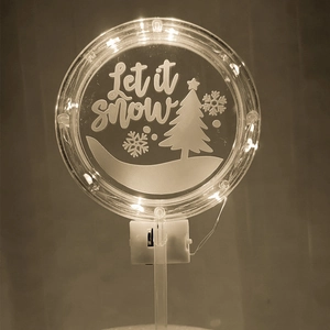 Luminous acrylic Christmas cake topper with warm LED lights and Let it Snow tree design