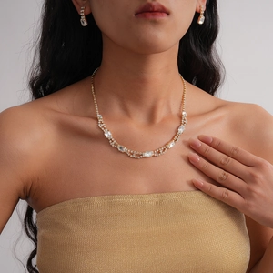 Elegant two-piece jewelry set with square diamond pendant necklace and matching earrings