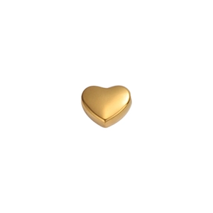 Macro detail of a 3D gold-polished stainless steel heart bead with a smooth mirror finish