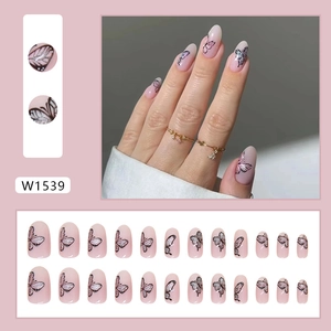 Pink cat eye press-on nails with glittery butterfly design and 24-piece full set