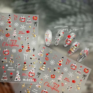 Détail d'autocollants nail art Noël M-1224 avec motifs de pommes rouges et sapins
