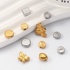 Polished stainless steel beads in bee, butterfly and heart shapes for DIY jewelry making