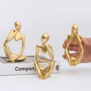 Set of 3 minimalist golden abstract thinker sculptures for modern home desk decor