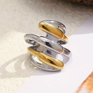 Modern deconstructed multi-layer hollow ring in mixed gold and silver tones
