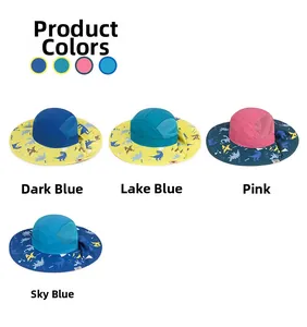 Détail de chapeaux de soleil pour enfants en quatre couleurs avec imprimés dinosaures et mesh