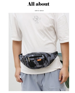 Detail of camouflage sports waist bag with black-grey pattern and orange Sport label