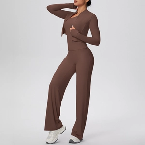 Detailed view of chocolate brown yoga set showing thumb-hole sleeves and flared yoga pants