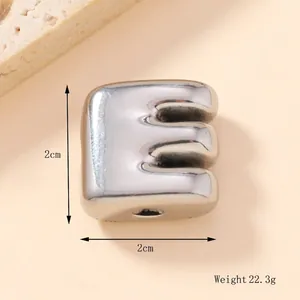Detailed macro view of silver bubble letter E pendant showing dimensions and 22.3g weight