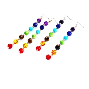 Handmade long hook earrings with colorful natural stone beads in a rainbow vertical design
