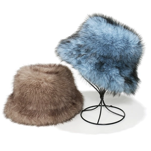 Plush faux fox fur bucket hats in gradient blue and brown for winter warmth