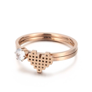 Elegant rose gold honeycomb heart ring with zircon inlay on a clean white background