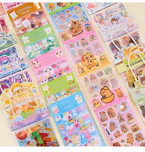 Detailed PET cartoon stickers showing cute series like KAPIBALA and dessert themes