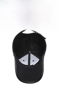Detail of black mesh baseball cap showing breathable inner structure and leather trim