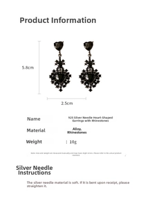 Detailed view of black heart dangle earrings with size measurements in 5.8cm x 2.5cm