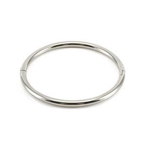 Close-up of polished silver titanium steel bangle with a seamless hidden hinge clasp