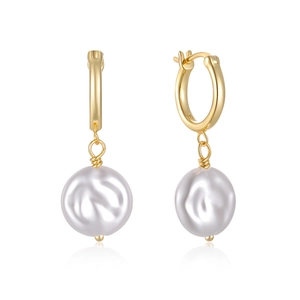 Macro detail of S925 hallmark on gold plated silver hoop with baroque pearl pendant
