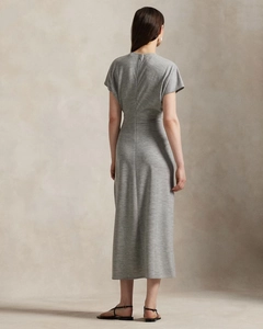Detail of grey knitted dress back showing concealed zipper and high-quality fabric texture