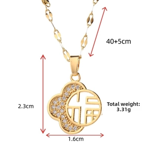 Detailed view of gold necklace featuring hollow Fu character and zircon clouds