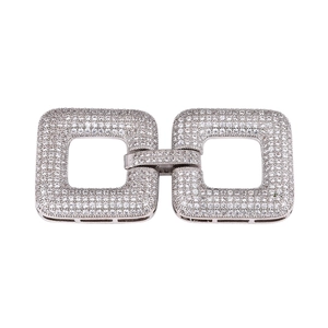 Macro shot of silver plated square jewelry clasp connector with sparkling zircon stones