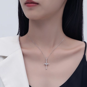 925 sterling silver heart cross necklace in silver finish worn by a model