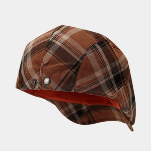 Plaid newsboy cap in brown and beige with contrast orange lining for autumn