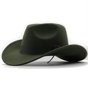Close-up of a dark green wool fedora with a black ribbon band and curved brim detail