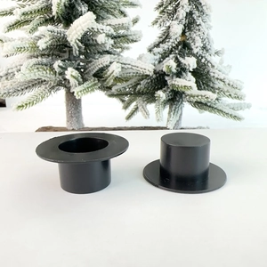 Mini black top hats for Christmas DIY crafts shown with snowy miniature trees