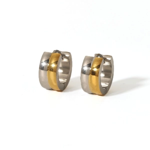 Macro shot of two-tone 18K gold plated stainless steel hoop earrings with polished finish