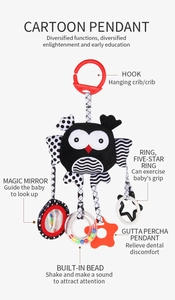 Baby visual training book with owl design featuring hook, rattle, mirror and teether
