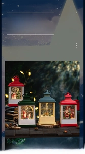 Detail of Christmas water globe lanterns with LED lighting and festive character scenes