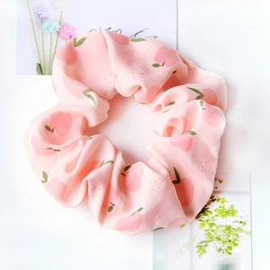 Pink peach pattern oversized fabric scrunchie with botanical cards on white background