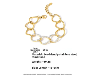 Detail of gold linked chain bracelet with crystal pavé rings and size specifications