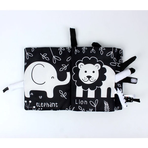 Detail of soft baby cloth book with high-contrast black and white animal patterns