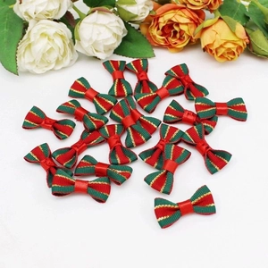 Christmas striped ribbon bows in red and green with gold trim for DIY pet accessories