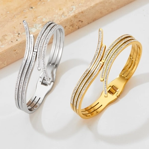 Creative open stainless steel bracelets in gold and silver with pave set cubic zirconia